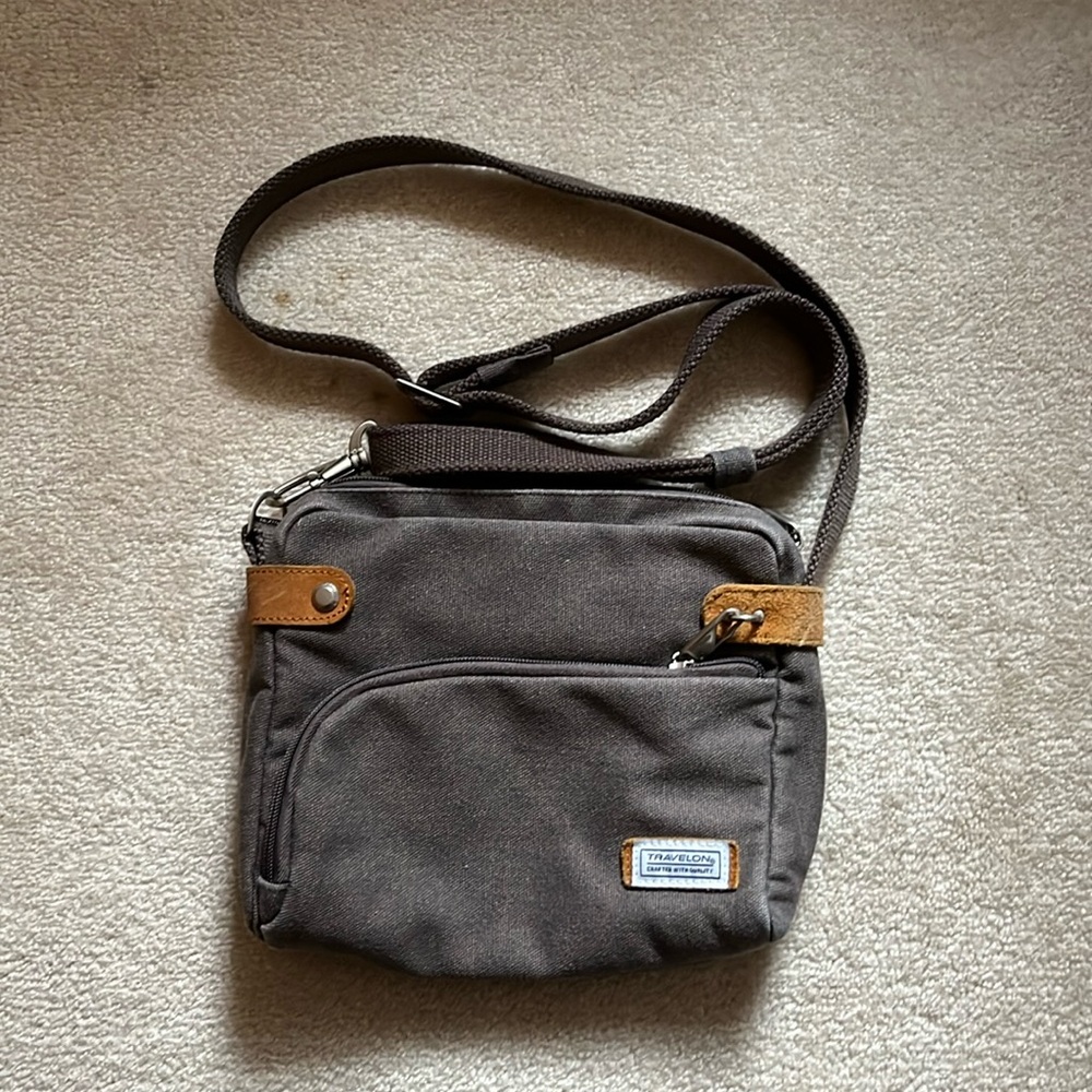Traveling grey with saddle leather. 9.5” x 8”x 2.5”
